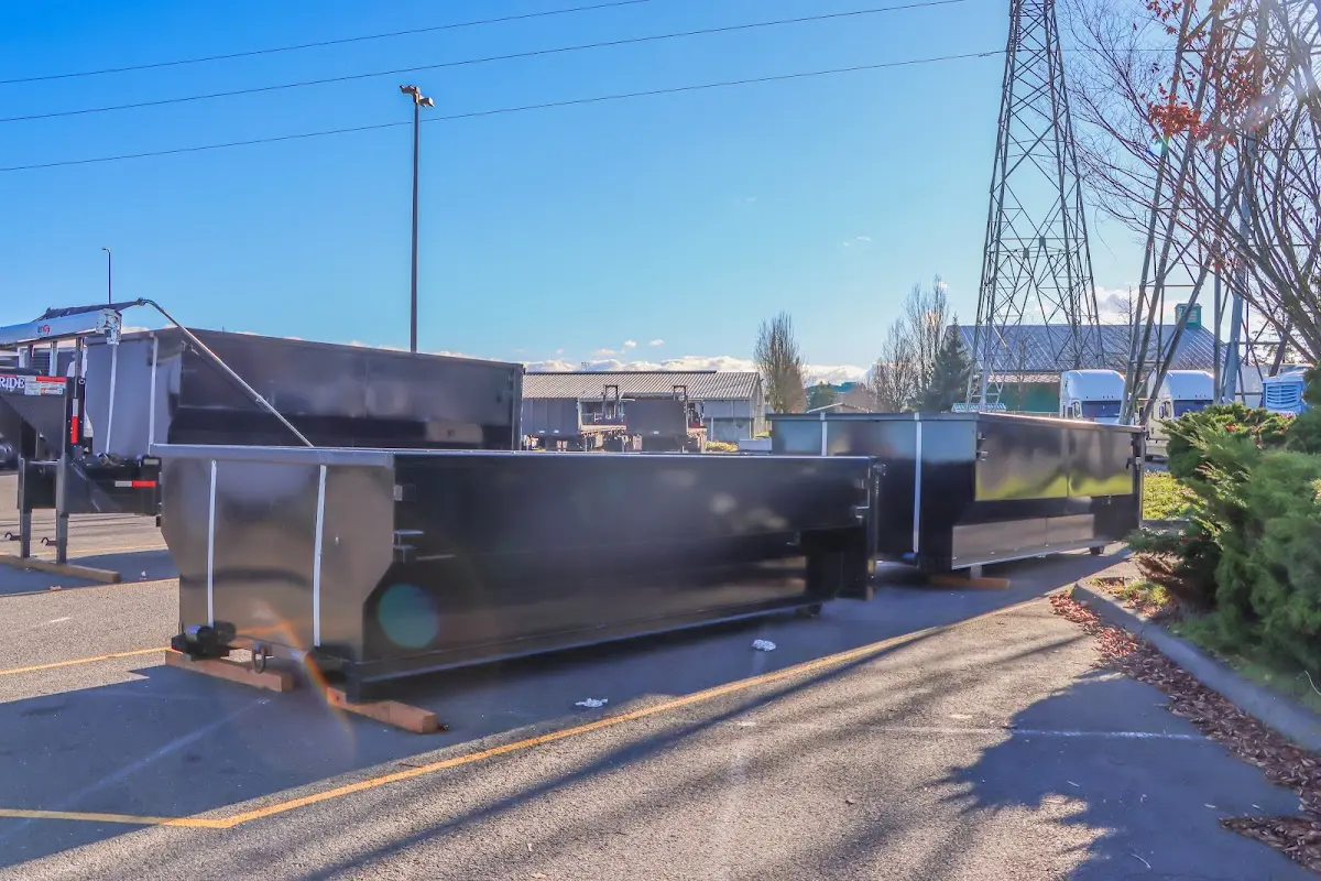 Roll-off dumpster ready for waste disposal at job site for Cleanout Dumpster Rental in Tupelo